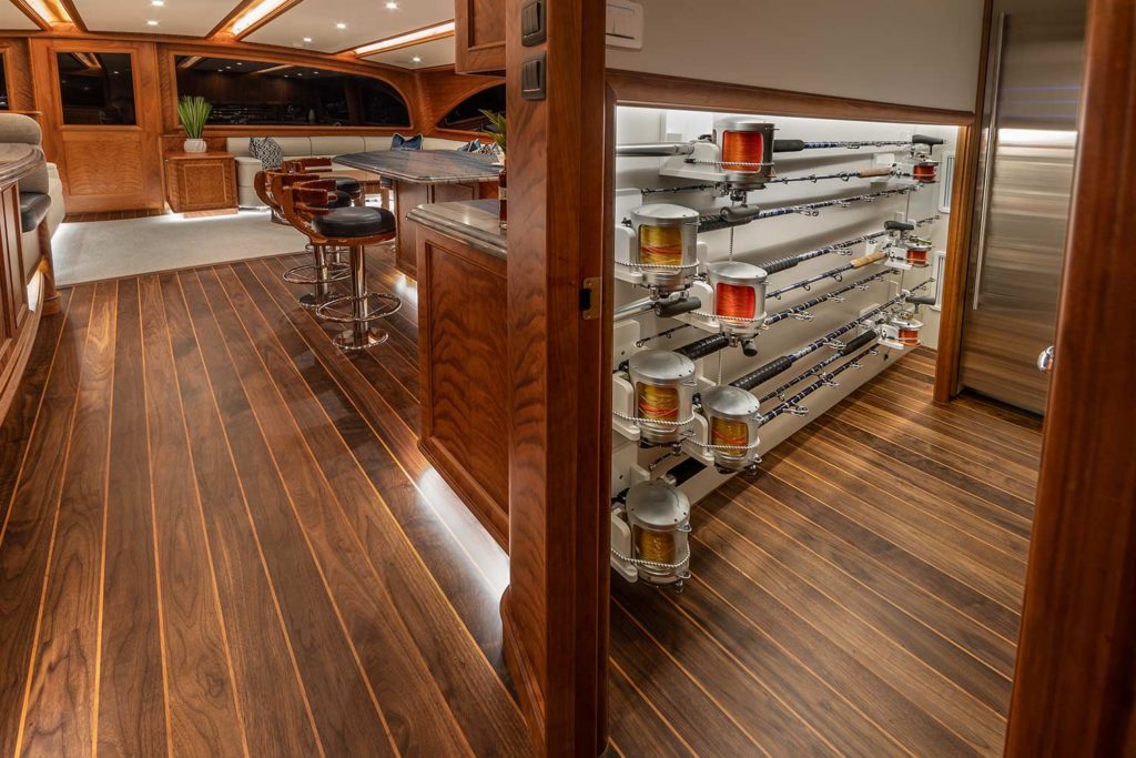 Wooden interior rod storage in a Jarrett Bay Boatworks sport fishing boat.