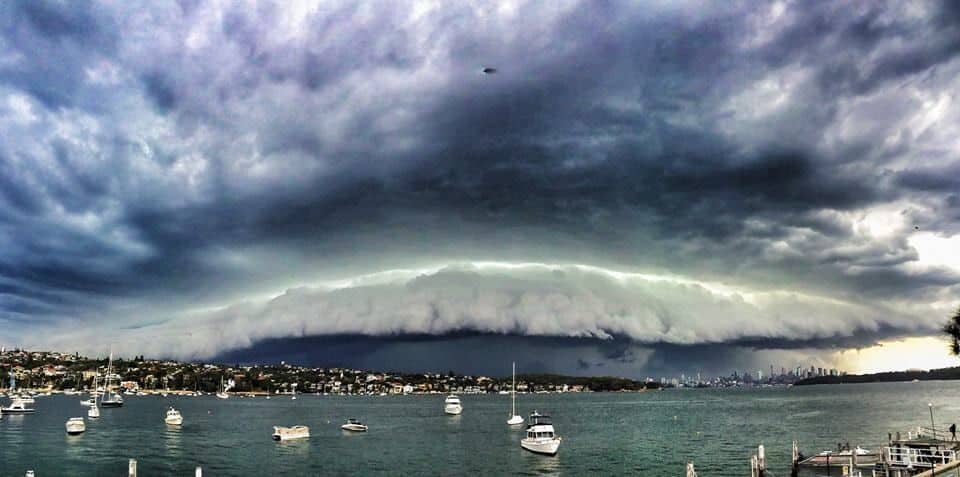 storm clouds form over water