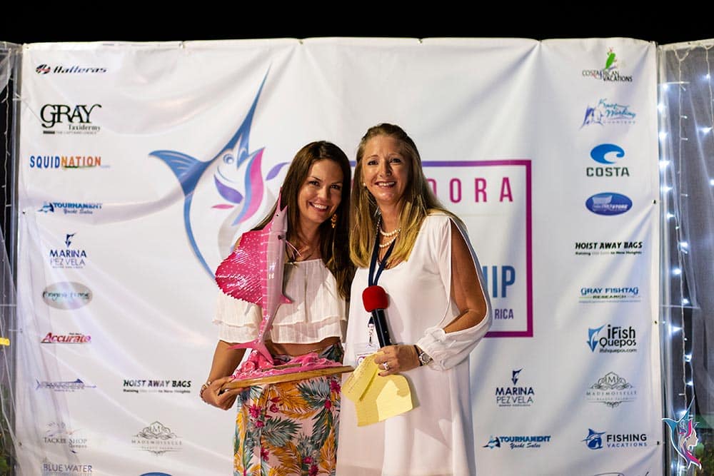 two women standing at awards at pescadora billfish championship