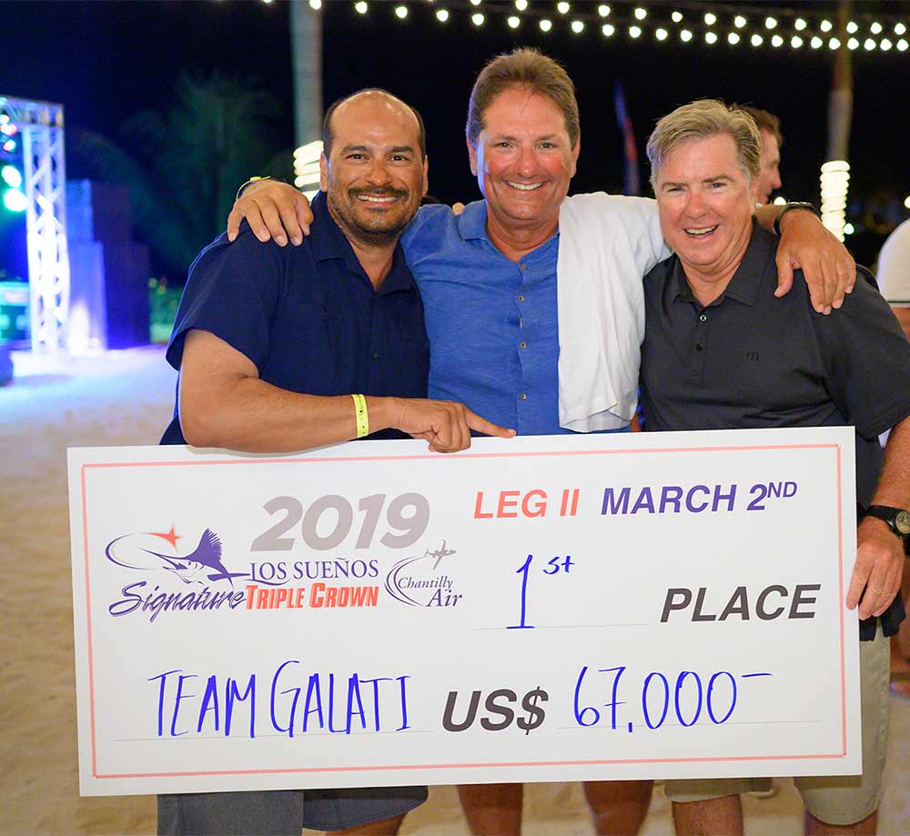 three men holding up a first place check
