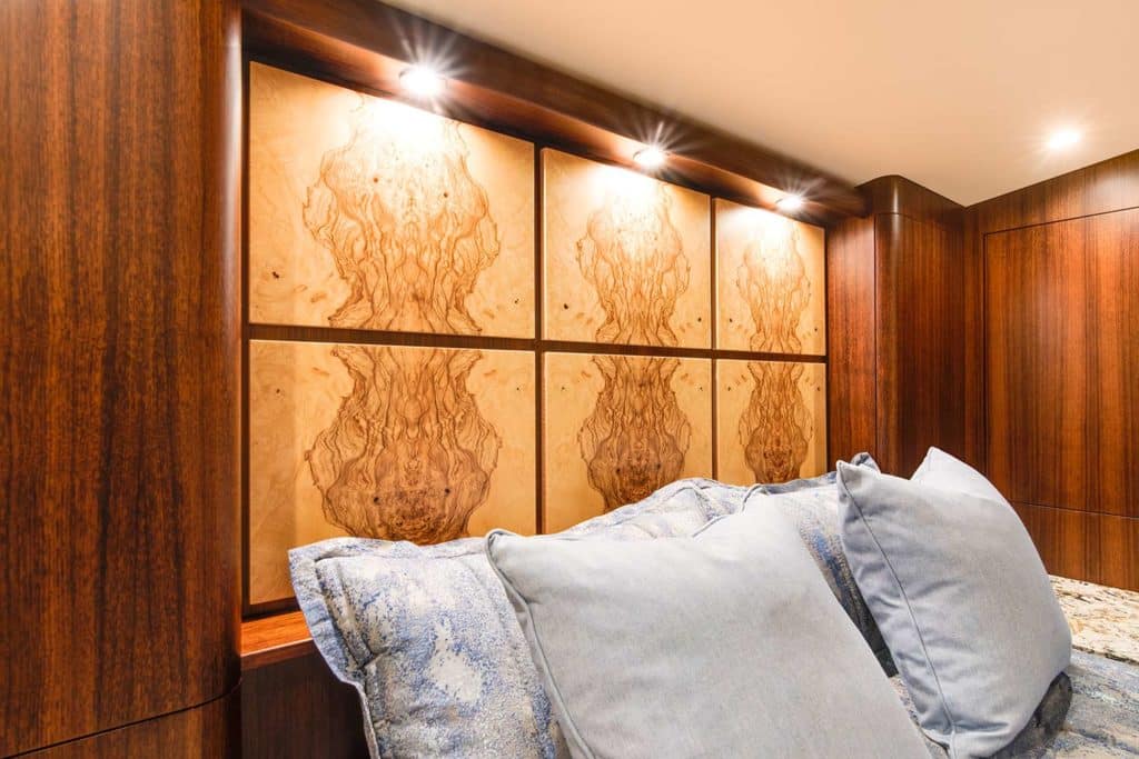 olive ash burl headboards used as a headboard in the staterooms of a Bayliss Boatworks sport fishing boat.