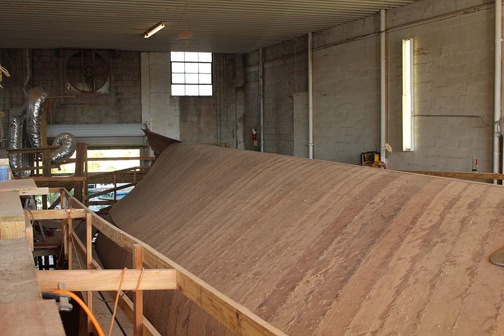 Rybovich boat hull with mahogany boards