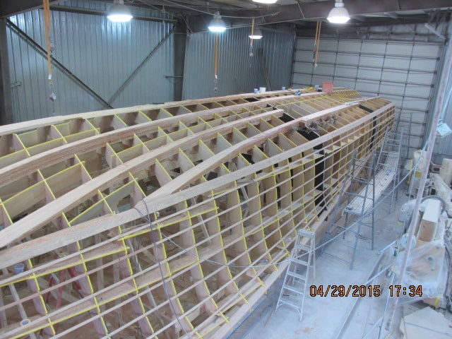 The forward stringers stay are eventually glassed and stay in the hull