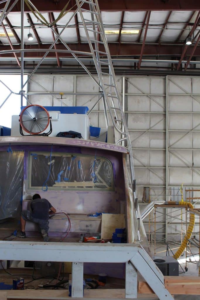 american custom yacht under construction with anodized tower