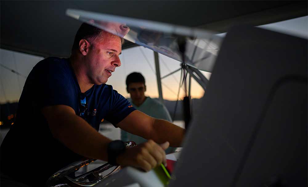 boat captain looking at navigation console