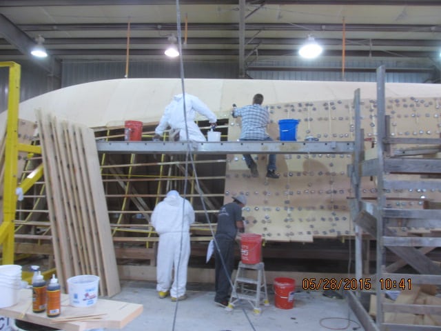 Generally the crew will work from the keel across the bottom and back to the other side