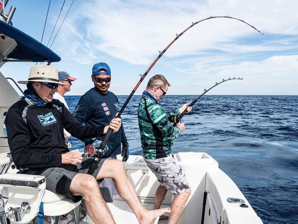 anglers fishing on a boat deck