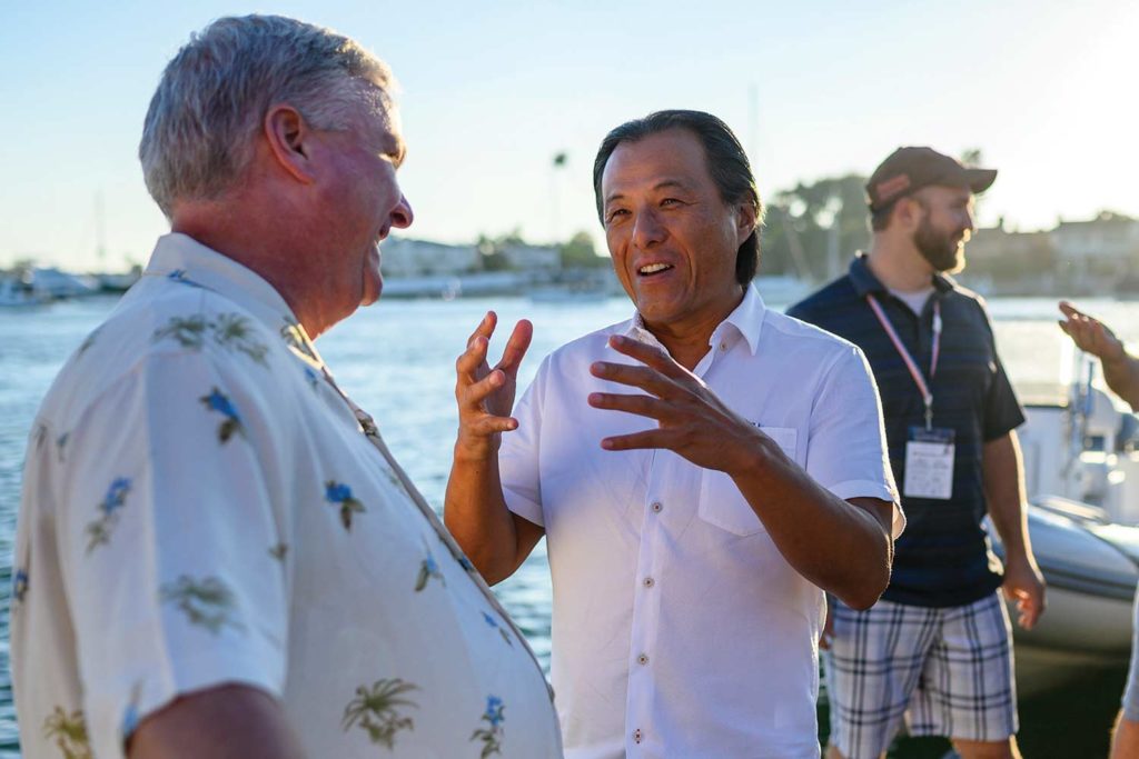 Anthony Hsieh and Thomas Kilgannon talking during War Heroes on Water.