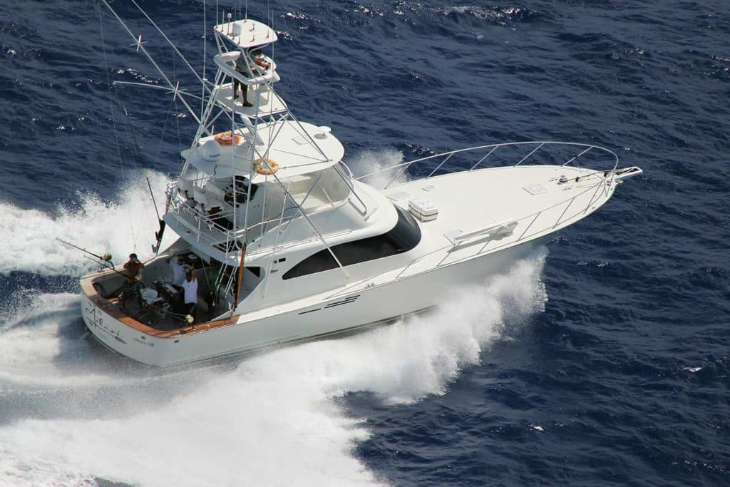 A sport fishing boat on the water.