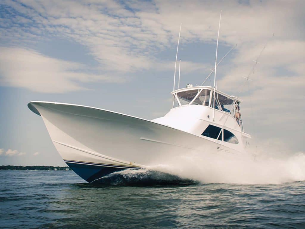 A sport fishing boat on the water.