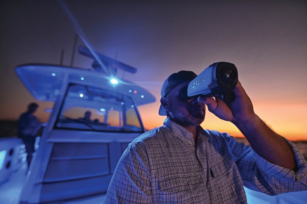 A person using a viewfinder.