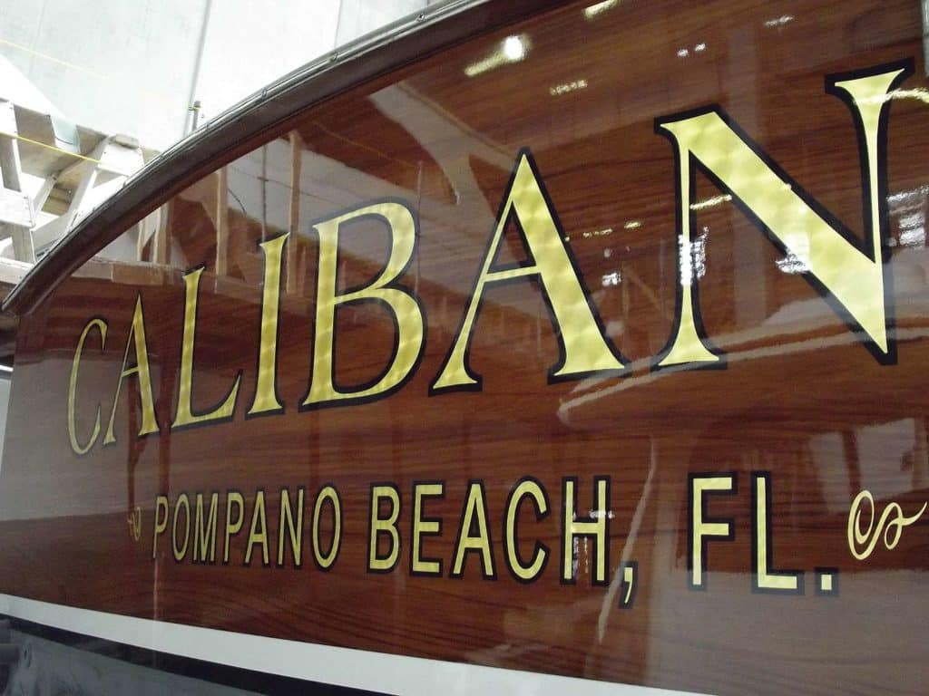 A sport fishing boat transom with the words: "Caliban, Pompano Beach, Fl."