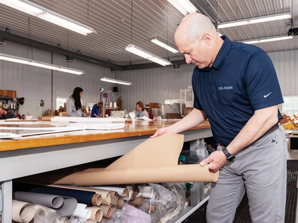 chris costa reviewing boat upholstery fabrics