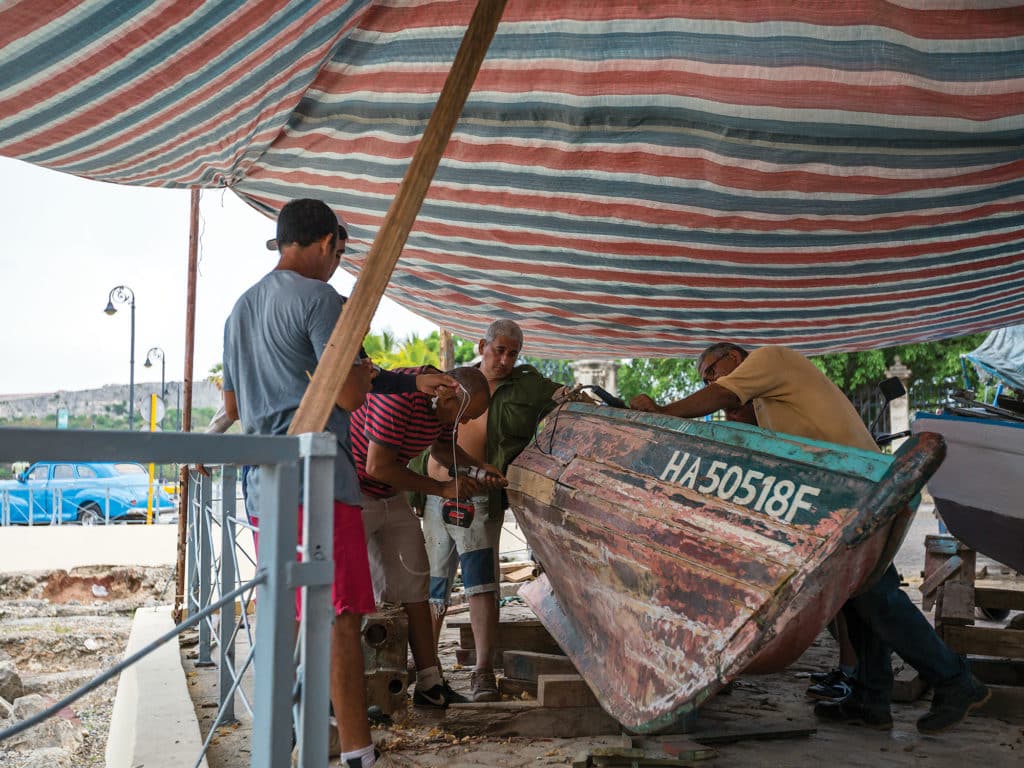 repairing boat in Cuba