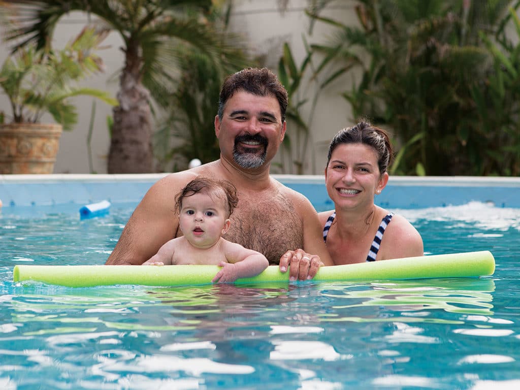 David and Kristen Salazar Casa Vieja Lodge Guatemala pool family portrait