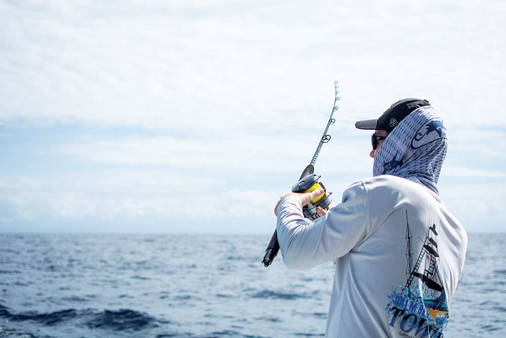 man fishing at sea