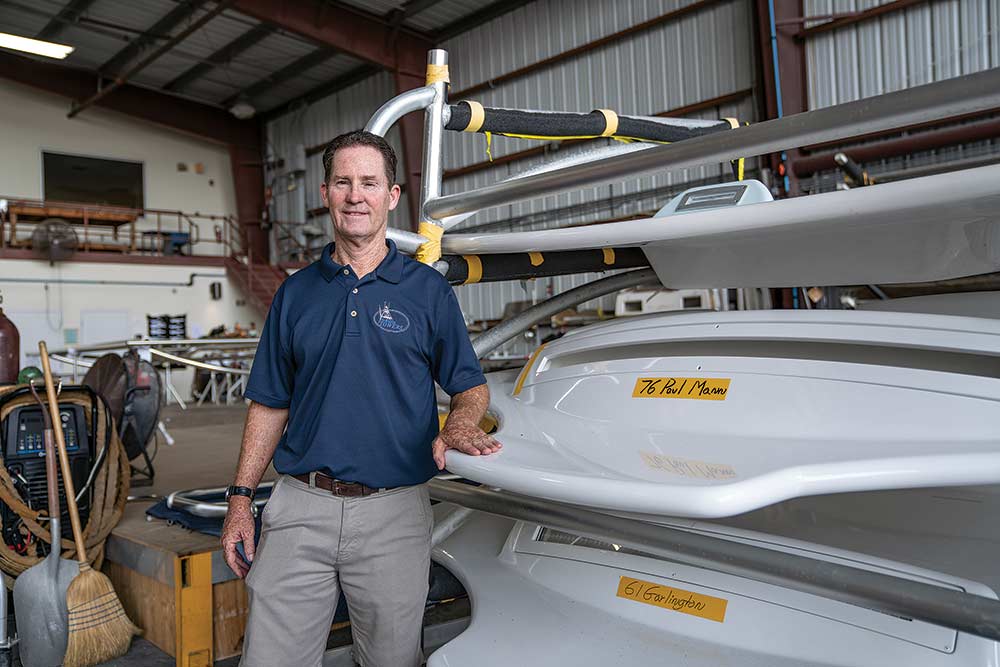 drew mcdowell standing in the palm beach county shop