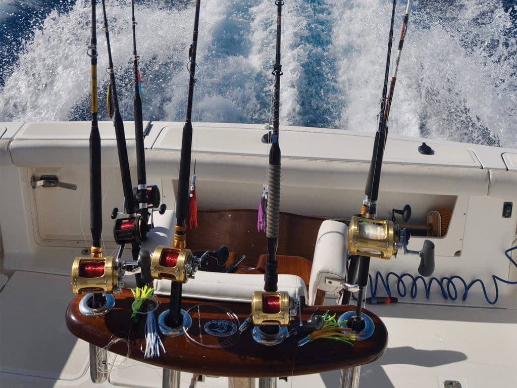 Sets of fishing reels and tackle set into the fighting chair.