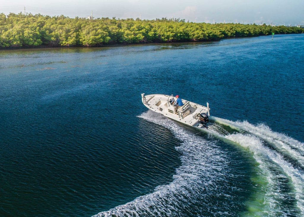 inshore boat making a turn on the water