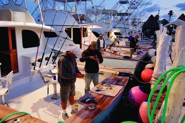 cleaning boat on the dock