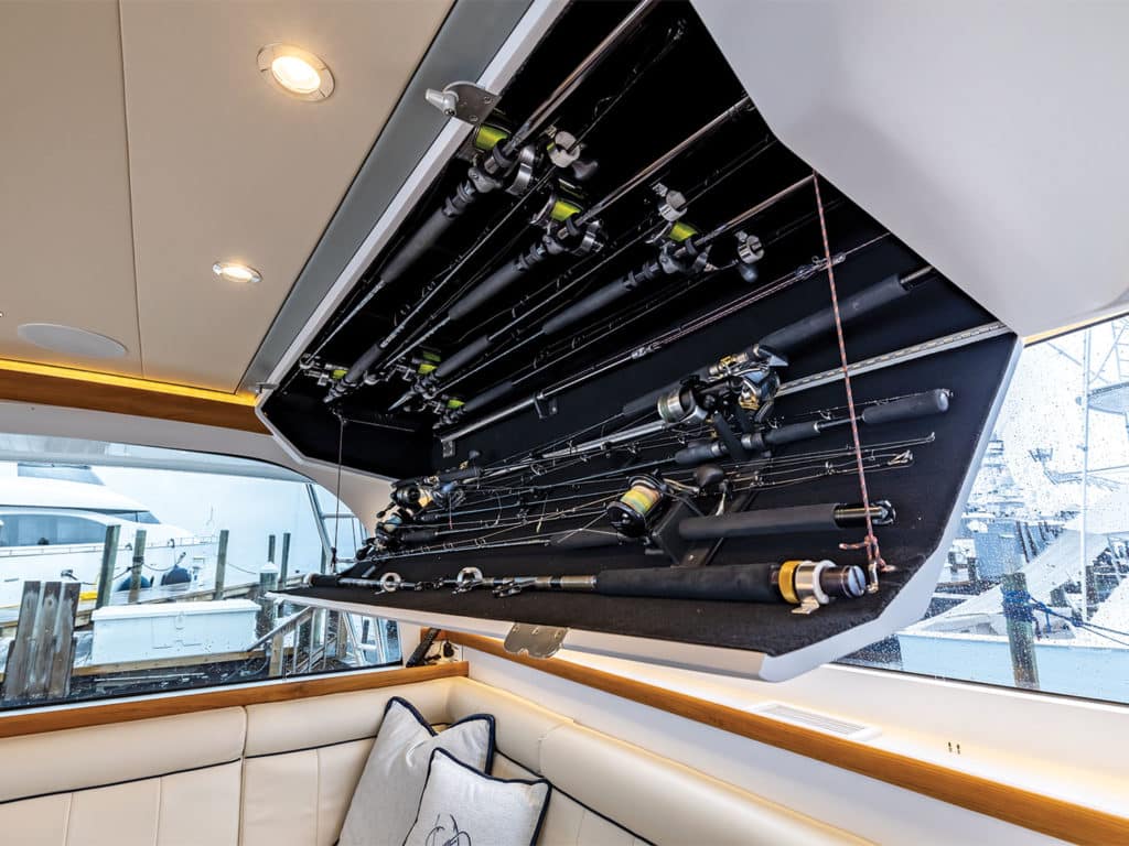 A drop-down cabinet of rod and reel storage on the F&S Boatworks 61 Hardtop Express.