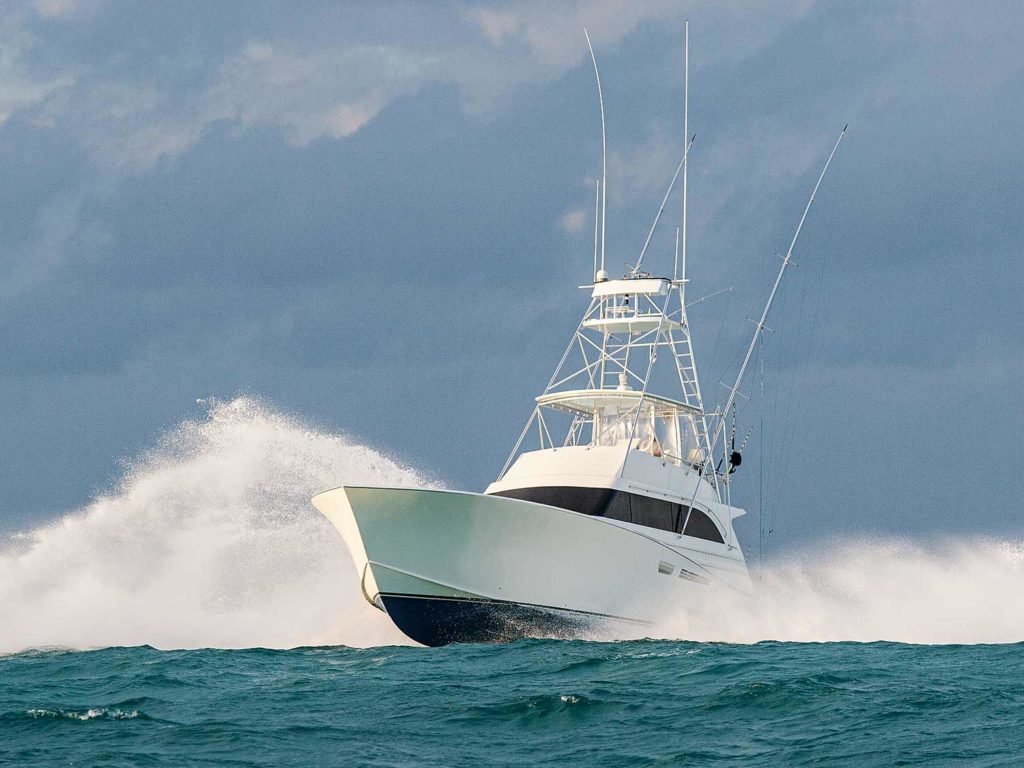 a monterey marine sport fishing boat named Glass Machine on the water