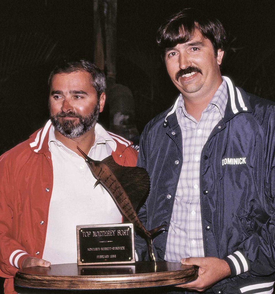 two men holding a sailfish trophy at the monterey-merrit-rybovich tournament