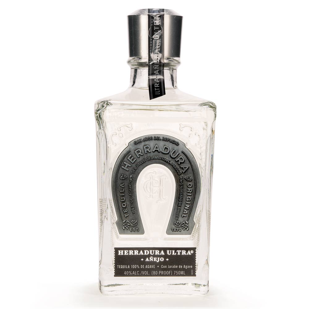 Herradura Ultra Añejo Tequila isolated on a white background.