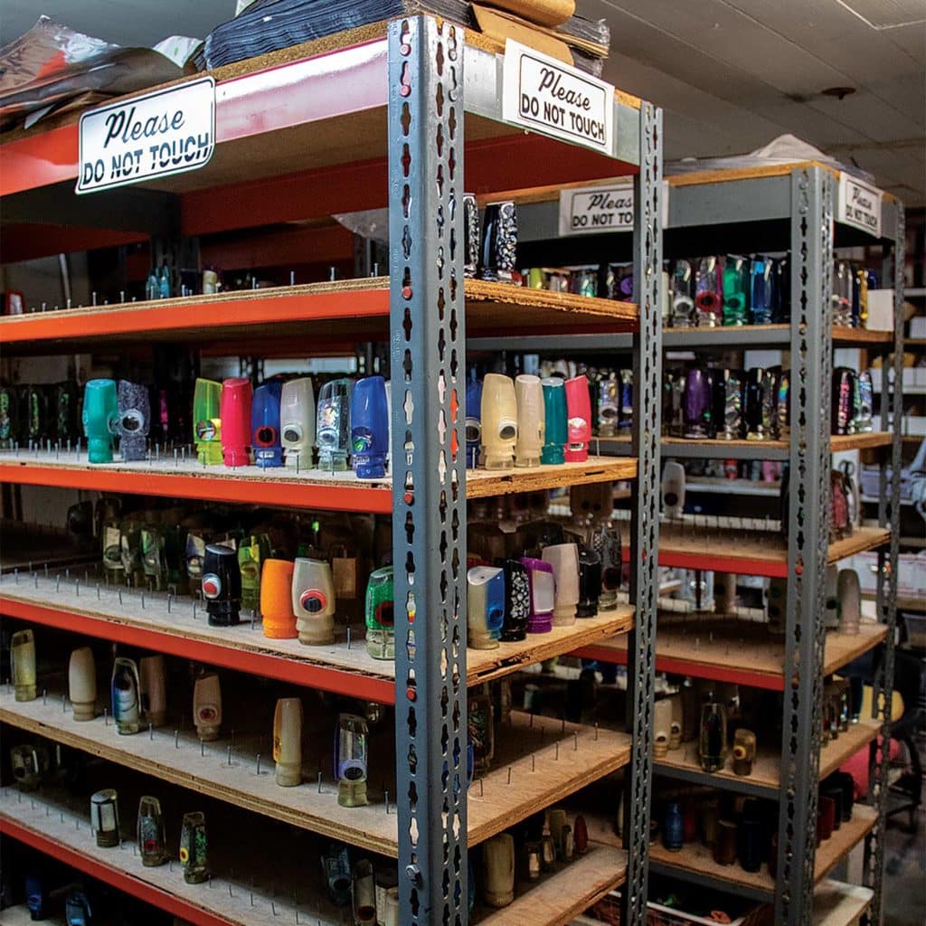 Workshop shelves full of hand-crafted marlin lures.