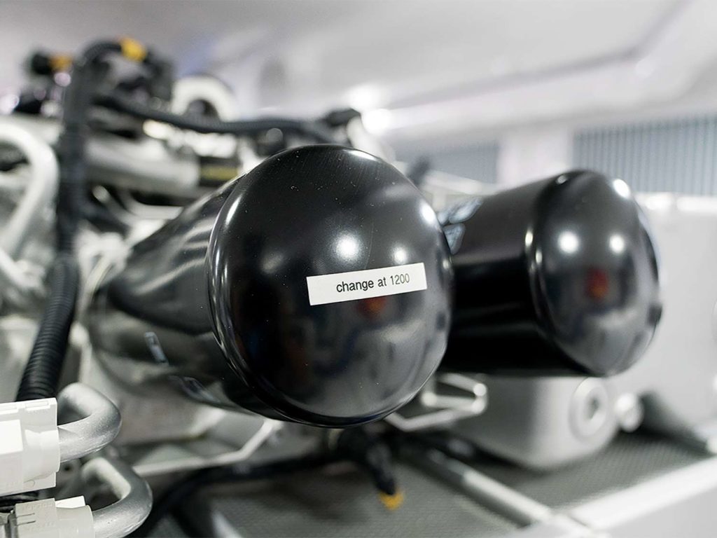 Oil filters in a sport fishing boat engine room.