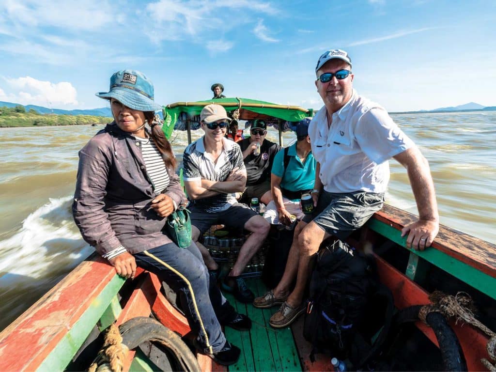 Marlin editor Sam White on a long-tail skiff on the kra buri river