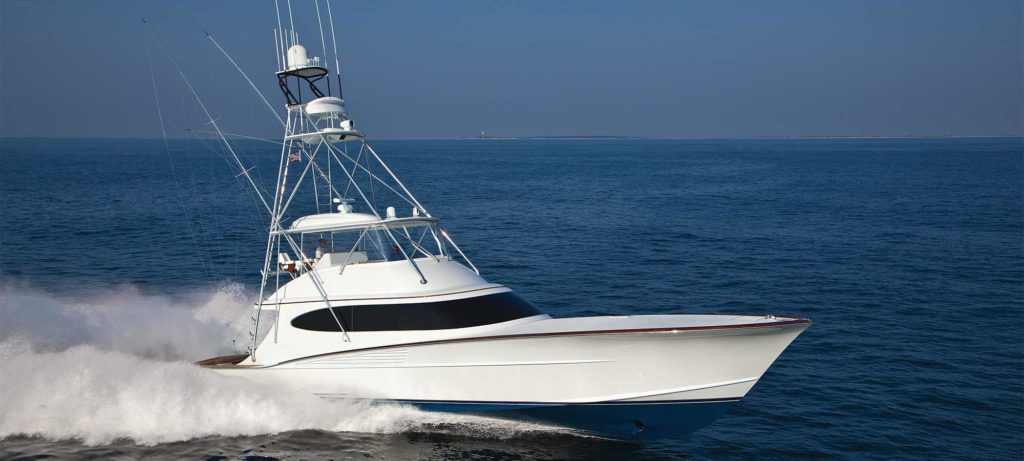 a sport fishing boat out on the water