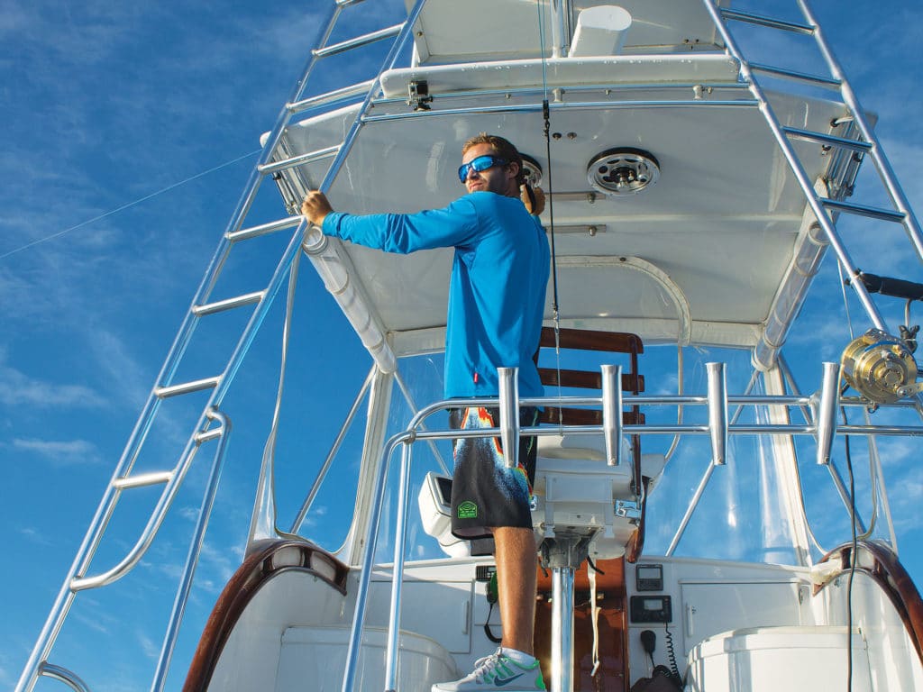 Capt. Chris Donato works the teasers from the bridge of Leilani, his 37-foot Merritt