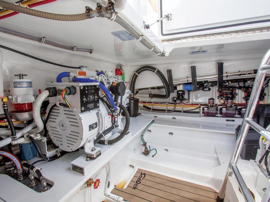 The below-deck compartment with sport-fishing boat parts.