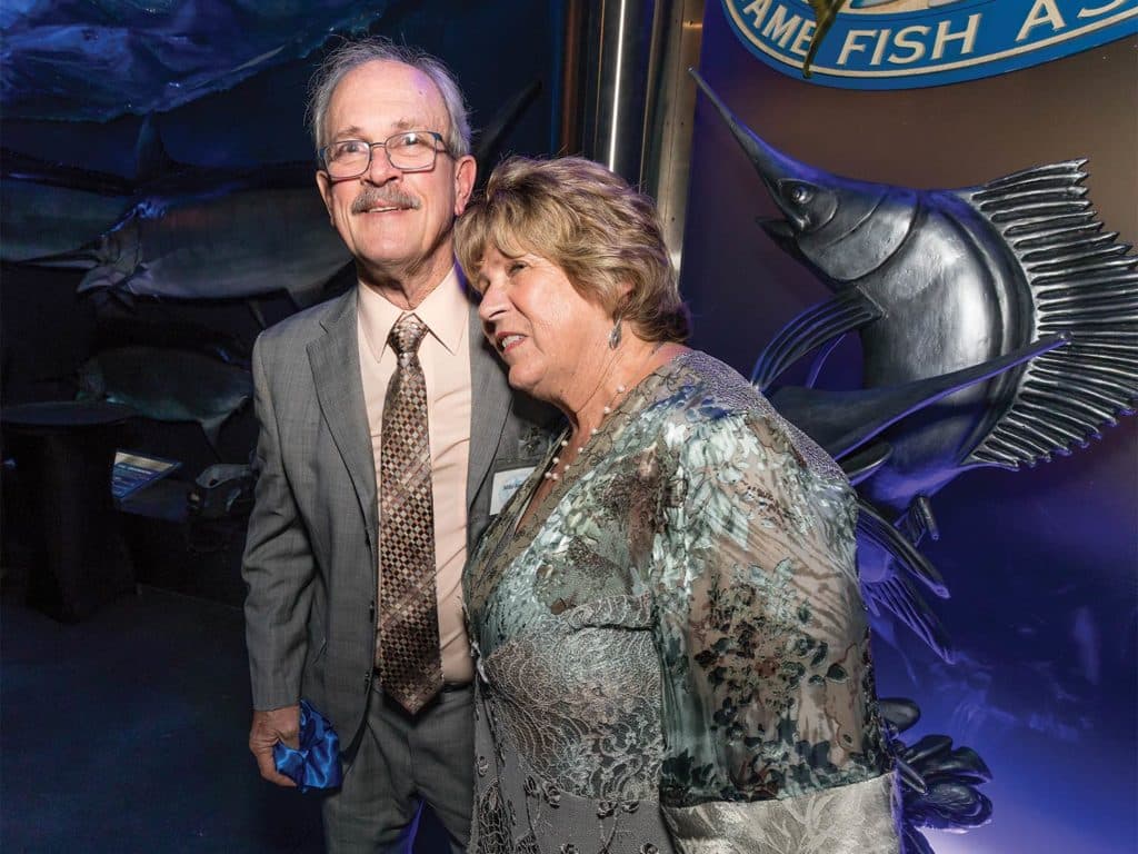 Mike and Terri Andrews, during her induction into the International Game Fish Association’s Hall of Fame at the Wonders of Wildlife National Museum and Aquarium in Springfield, Missouri.