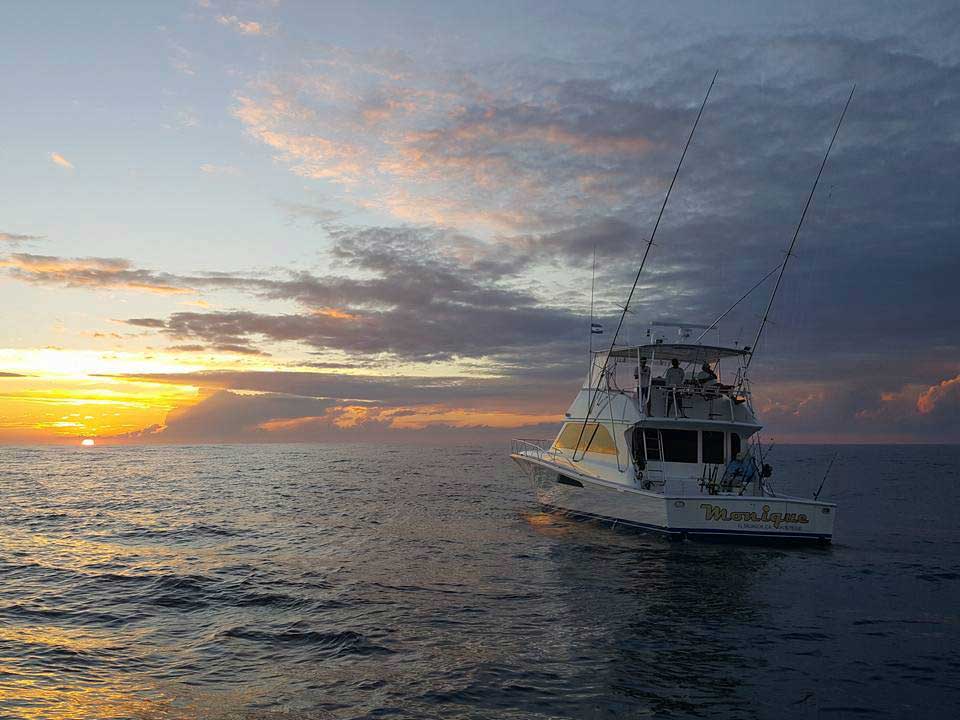 Monique fishing boat heads offshore in El Salvador