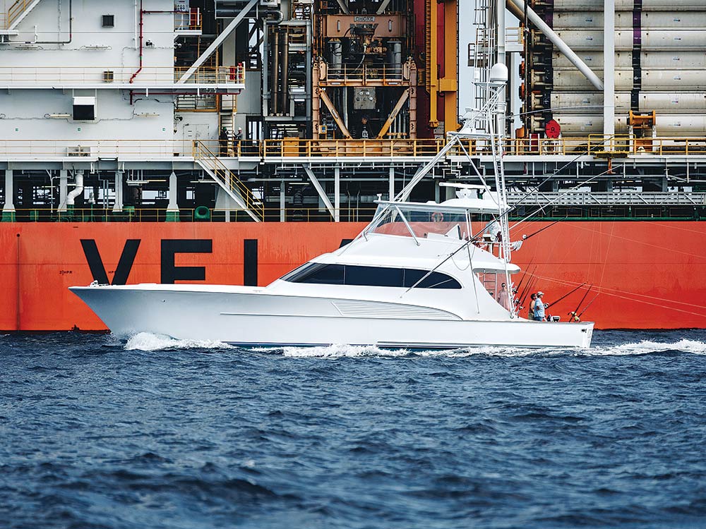 sport-fishing yacht on water