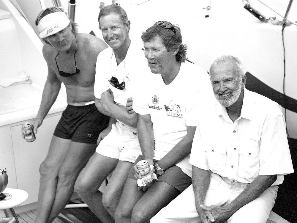 black and white image of boat captain and crew