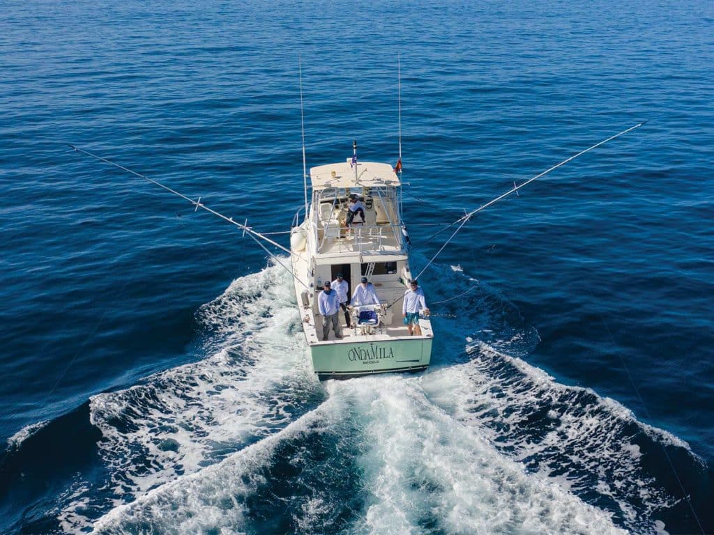 A sport-fishing boat on the water.