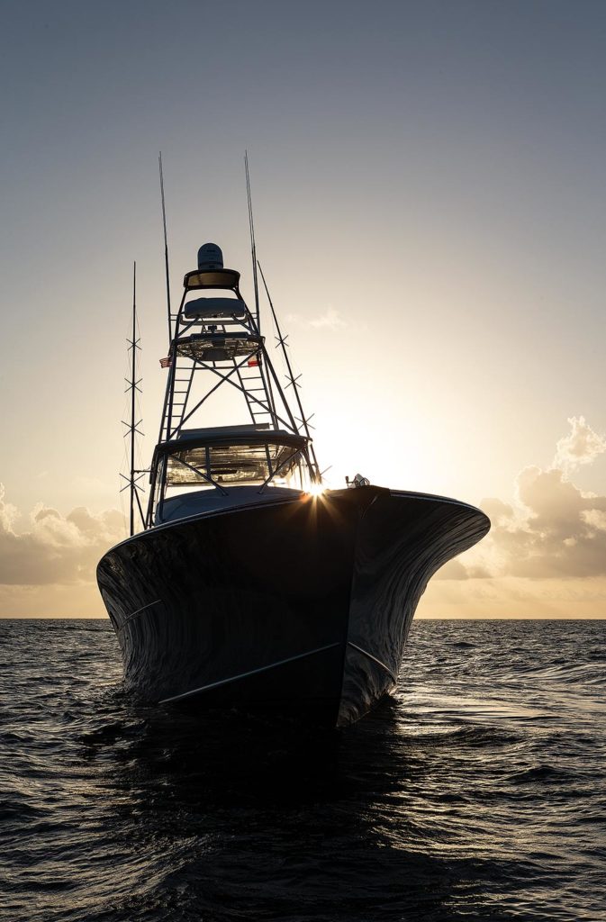 silhouette of boat at sunset