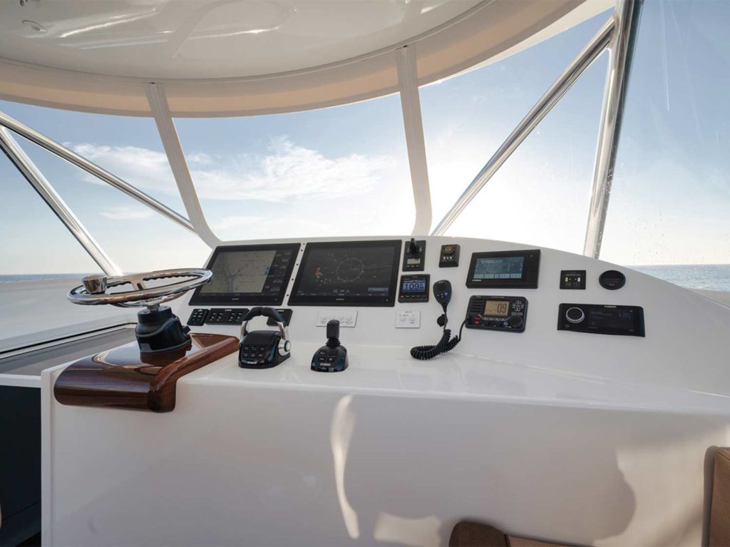 A lower helm station on board a sport-fishing boat.