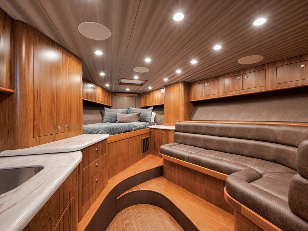 The luxurious interior salon lounge of a sport-fishing boat.