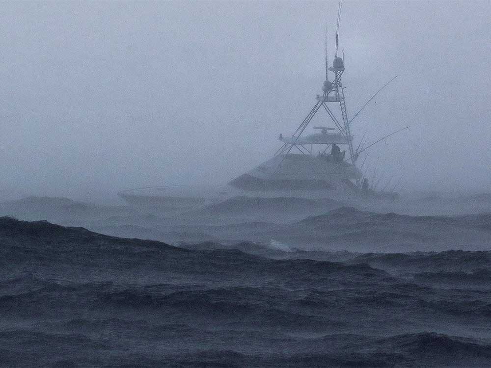 sport fishing boat on the water during rough weather