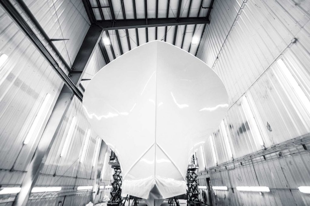 A repainted sport fishing boat in dry dock.