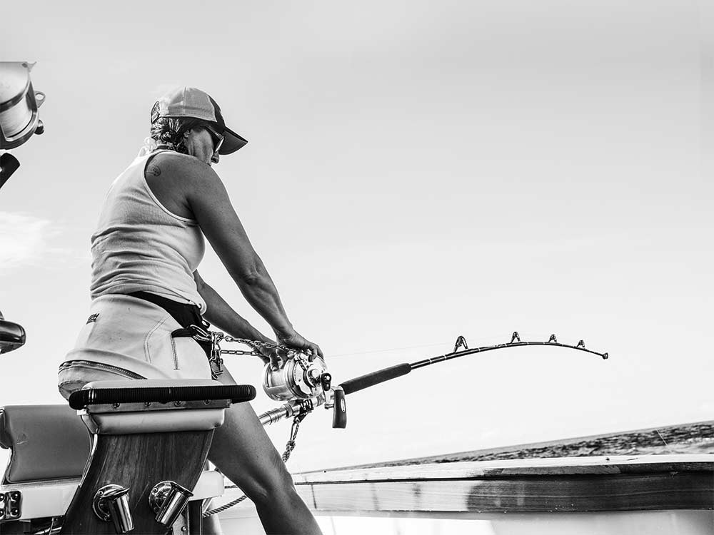 woman fishing for blue marlin