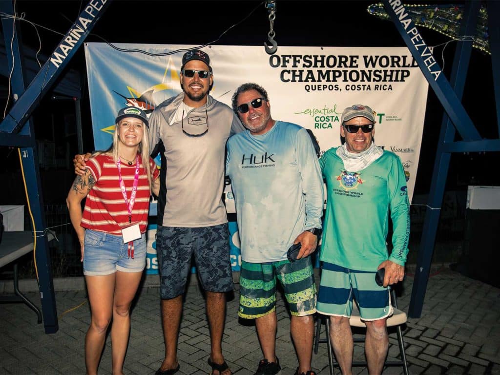 A sport-fishing team at an awards ceremony.