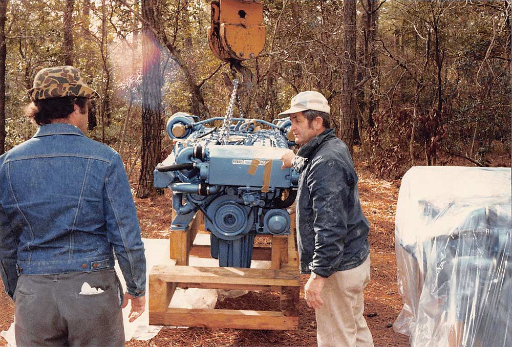 omie tillet next to engine