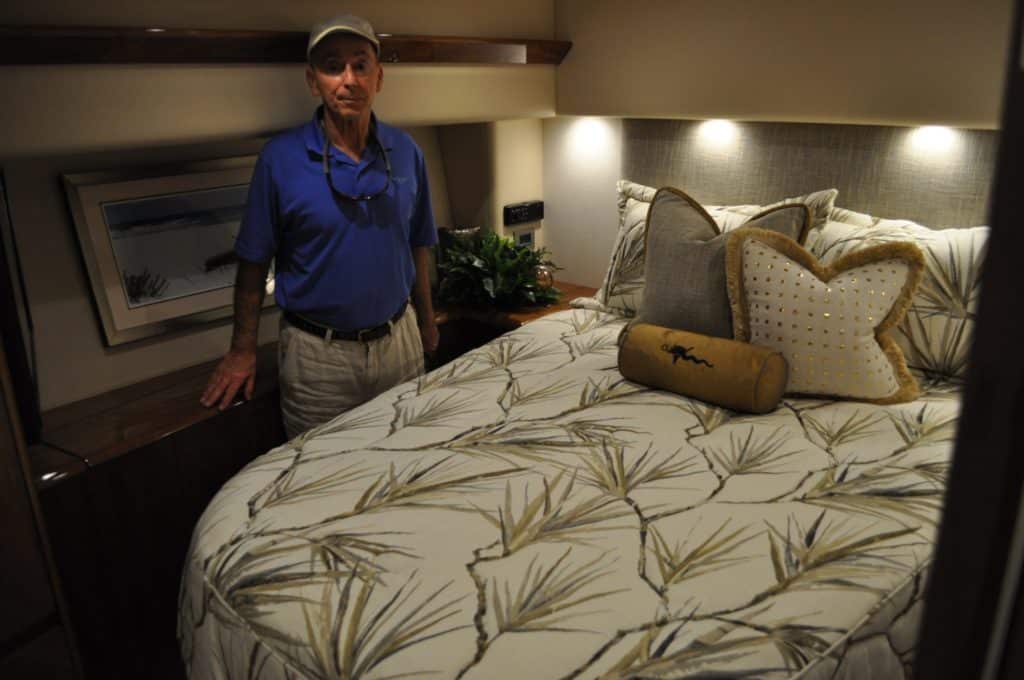 Frederiksen shows off the headroom in the master stateroom.