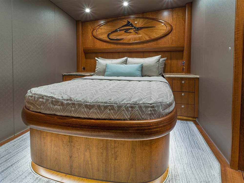 a bedroom in the willis 77 uno mas yacht