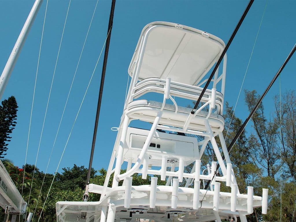 A large tower atop a sport-fishing boat.